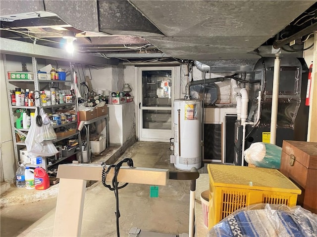 unfinished below grade area featuring water heater