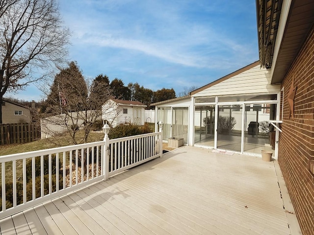 deck featuring a sunroom