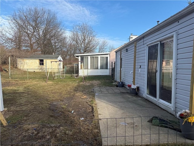 view of yard with a patio and fence