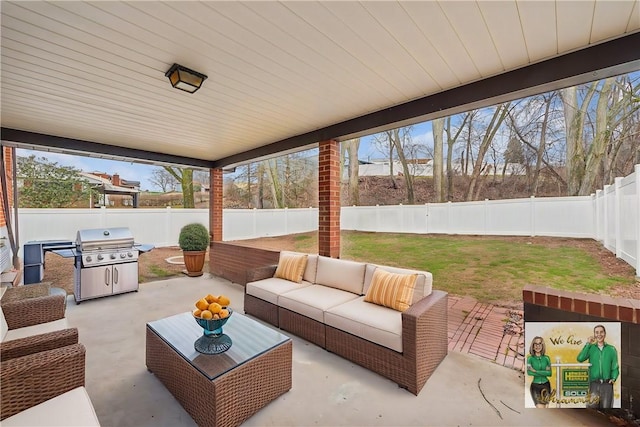 view of patio / terrace featuring outdoor lounge area, a fenced backyard, and grilling area