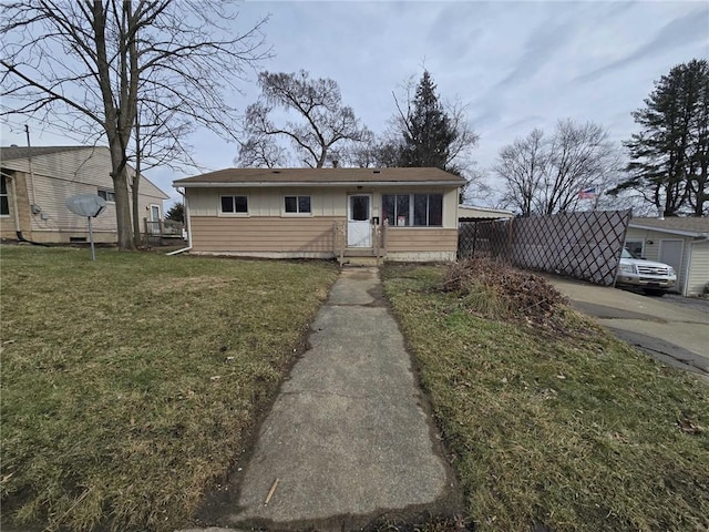 view of front of property with a front lawn