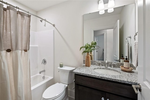 full bath with vanity, toilet, and shower / bath combo with shower curtain