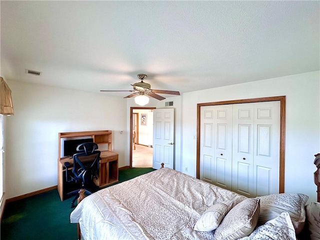 bedroom with baseboards, visible vents, ceiling fan, carpet floors, and a closet