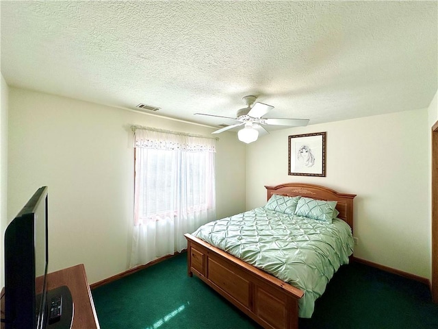 bedroom with carpet, ceiling fan, visible vents, and baseboards