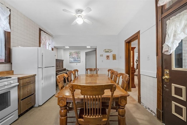 dining room featuring ceiling fan