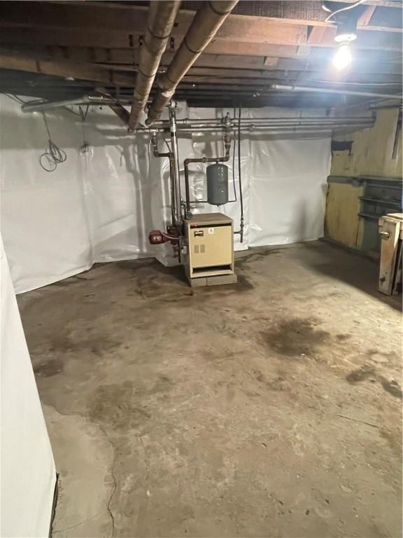 205 4th St, Freeport Boro, PA 16229 - unfinished basement featuring a heating unit