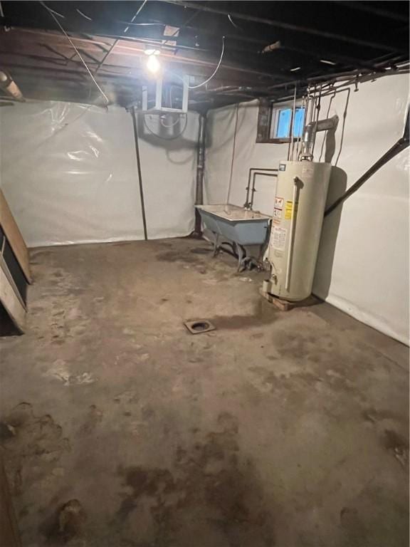 205 4th St, Freeport Boro, PA 16229 - unfinished below grade area featuring a sink and gas water heater