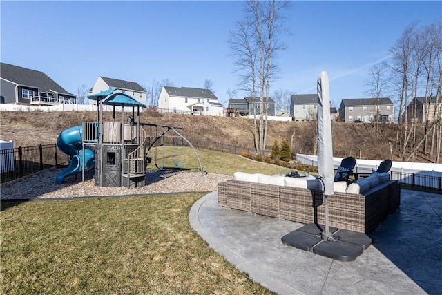 view of playground featuring a residential view, fence, outdoor lounge area, and a lawn