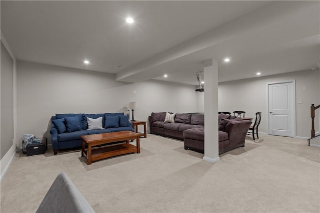 living room featuring light carpet, baseboards, and recessed lighting