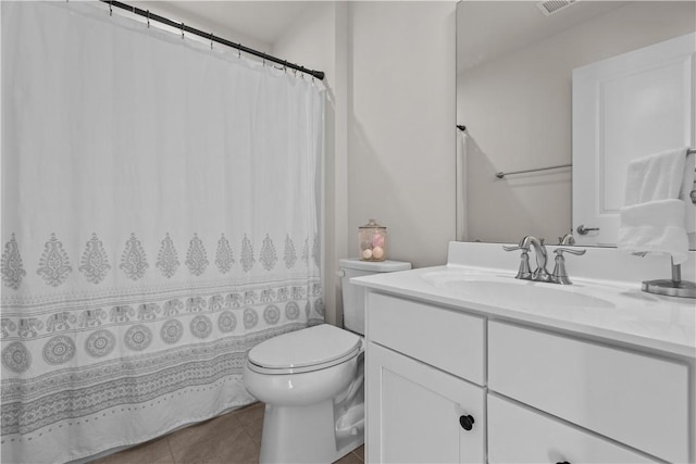 full bathroom featuring vanity, tile patterned flooring, toilet, and a shower with curtain