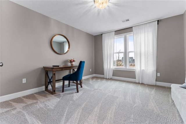 office with baseboards, visible vents, and carpet flooring