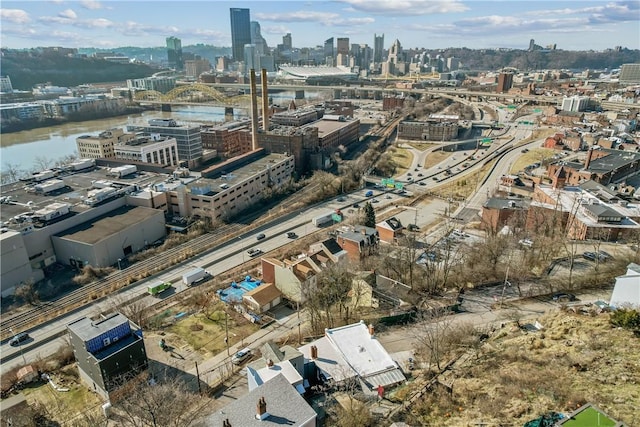 birds eye view of property with a city view