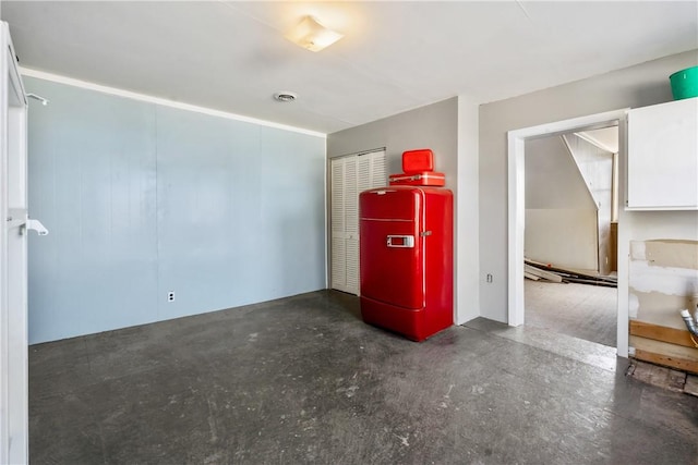 empty room featuring concrete flooring and visible vents