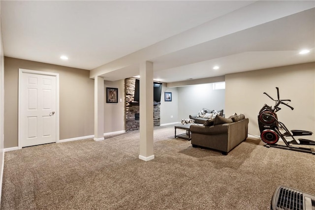 carpeted living room featuring baseboards and recessed lighting