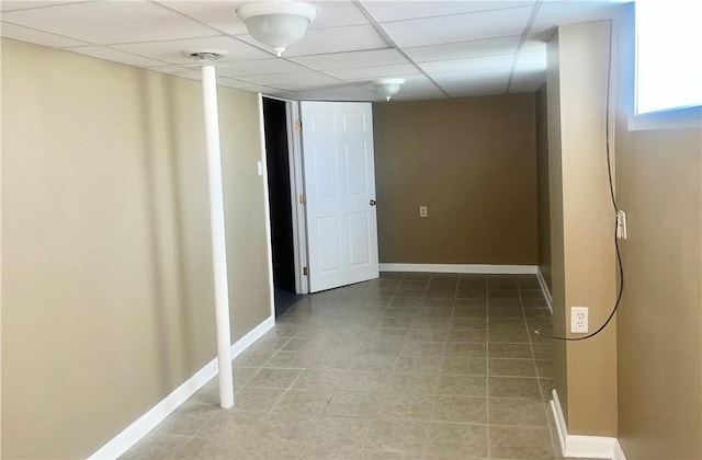 211 Roberts St, West Mifflin, PA 15122 - interior space featuring baseboards, light tile patterned floors, and a drop ceiling