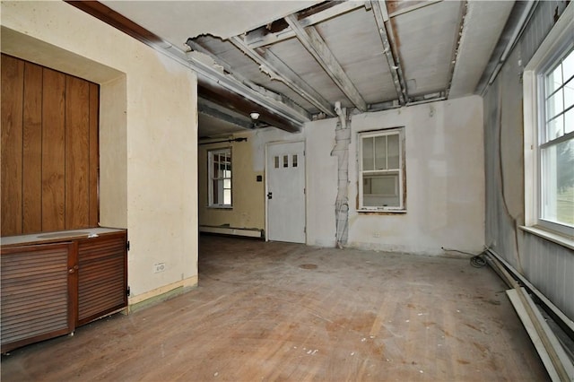 spare room featuring a baseboard heating unit