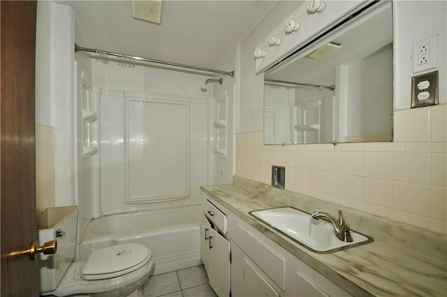 full bathroom featuring bathtub / shower combination, backsplash, toilet, vanity, and tile patterned flooring