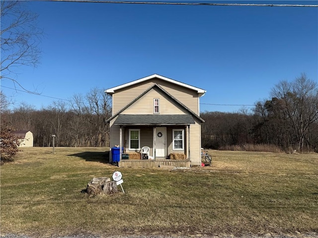 view of front of house featuring a front lawn and a porch