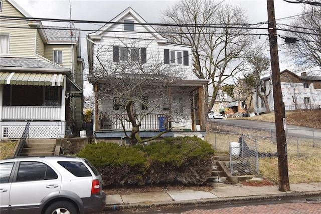 multi unit property featuring fence