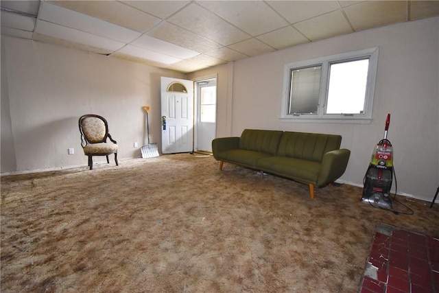 sitting room featuring plenty of natural light, carpet, and a paneled ceiling