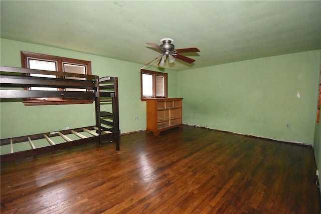 unfurnished bedroom with wood finished floors