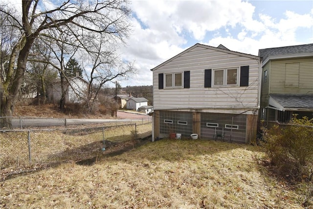 view of side of property with fence