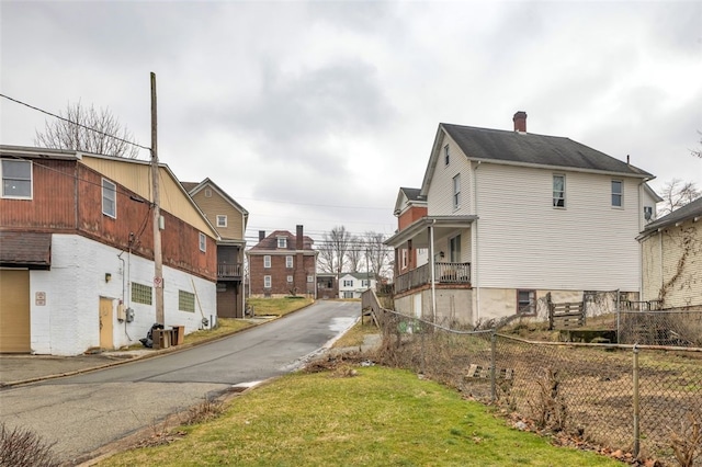 view of street featuring a residential view