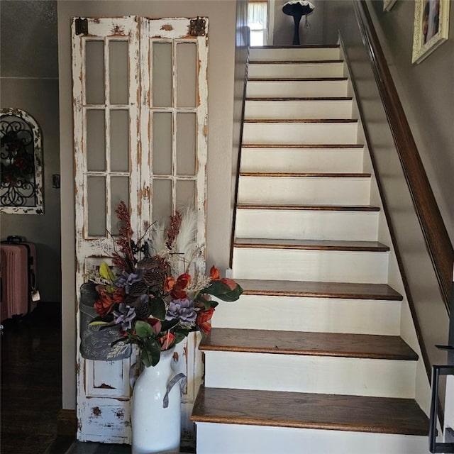 stairway featuring radiator