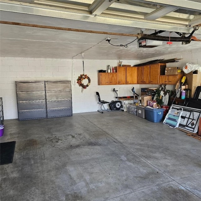 garage featuring concrete block wall