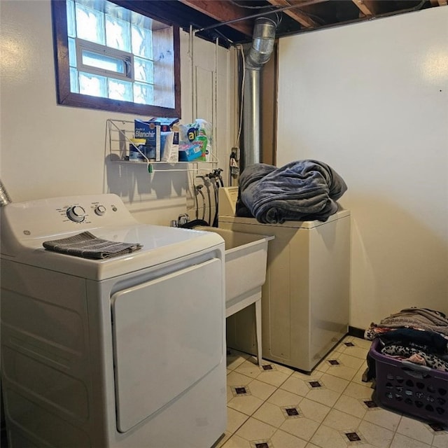 127 Stickle Rd, Chippewa Twp, PA 15010 - laundry room featuring washing machine and clothes dryer and light tile patterned flooring