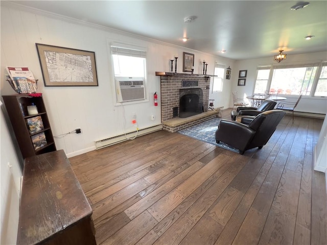 living room with dark wood-style floors, a fireplace, a baseboard heating unit, and cooling unit