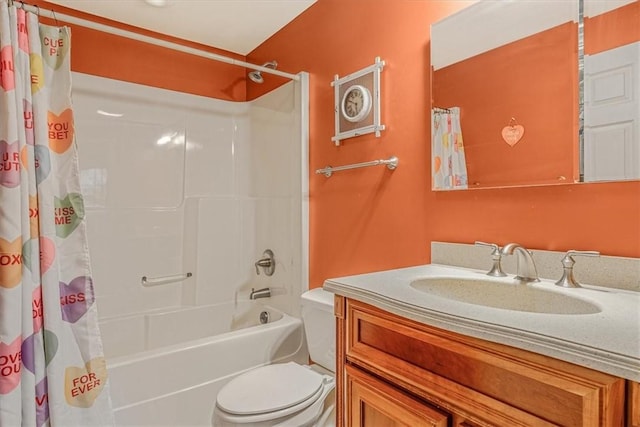 full bath featuring shower / tub combo, vanity, and toilet