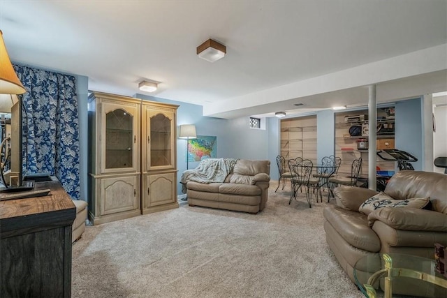 living area featuring carpet floors