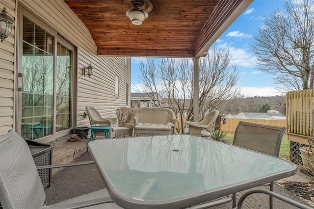 view of patio featuring outdoor dining area