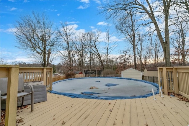 wooden deck featuring fence