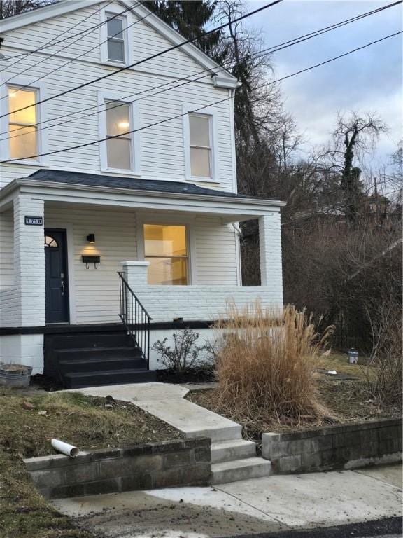 view of front of house with covered porch