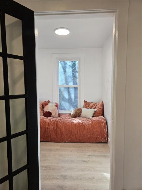 bedroom featuring light wood-type flooring