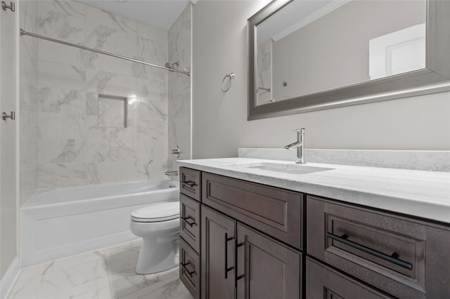 bathroom featuring toilet, marble finish floor,  shower combination, and vanity