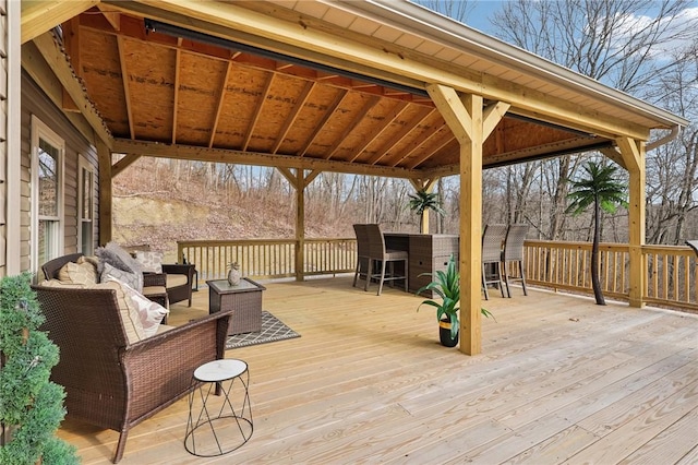 deck featuring a gazebo and an outdoor hangout area