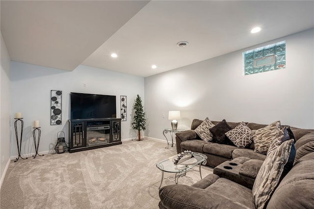 living area featuring baseboards, carpet flooring, and recessed lighting