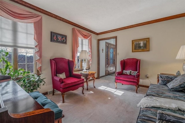 living room featuring baseboards, carpet floors, and crown molding