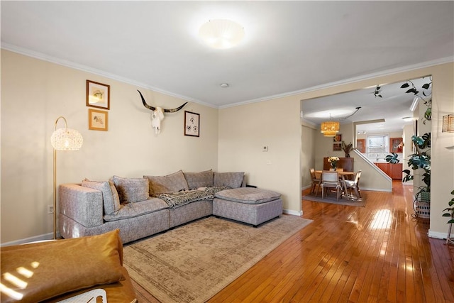 919 Eleanor St, South Side, PA 15203 - living room featuring wood-type flooring and ornamental molding