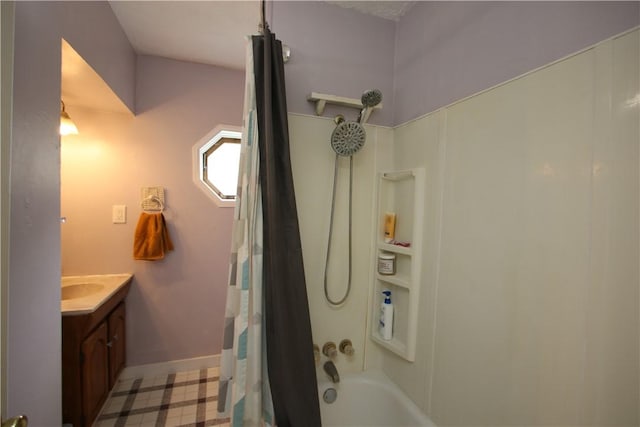 full bathroom featuring shower / bath combination with curtain, vanity, and baseboards