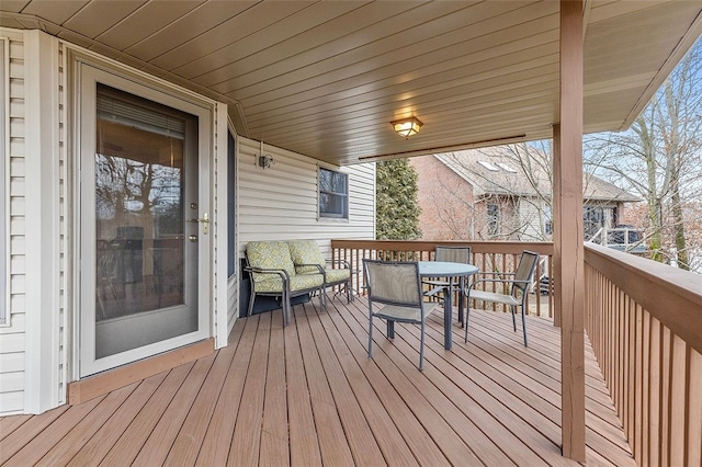 deck featuring outdoor dining space