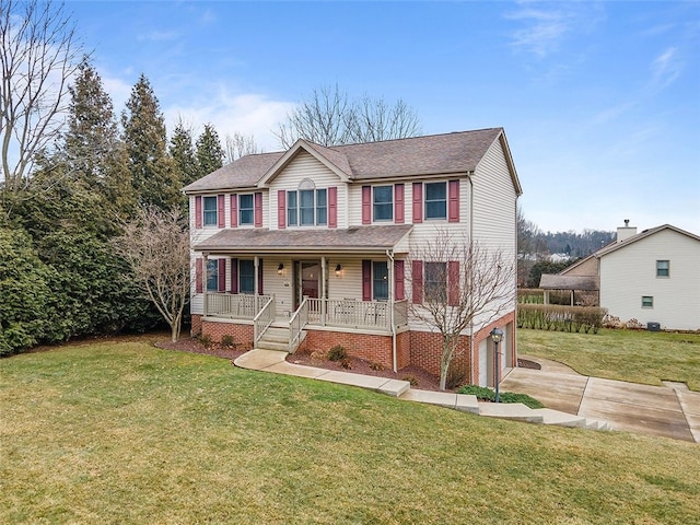 view of front of house featuring covered porch, concrete driveway, a front yard, and a garage