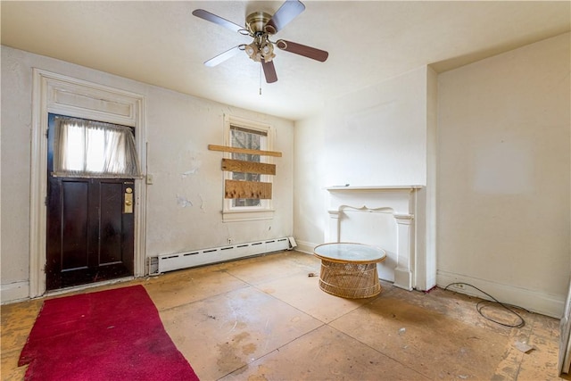 entryway with ceiling fan, a baseboard heating unit, and baseboards