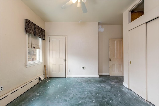 unfurnished bedroom featuring ceiling fan, baseboard heating, unfinished concrete flooring, and baseboards