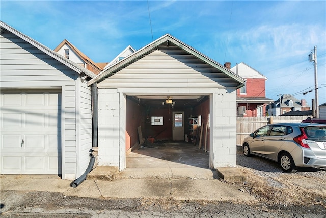 garage featuring fence