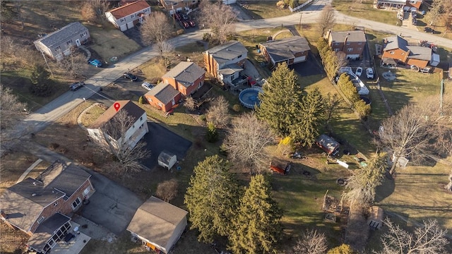 birds eye view of property with a residential view