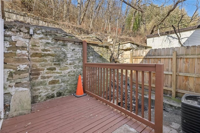 deck featuring fence and central air condition unit